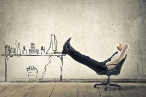 young-businessman-relaxes-sitt
