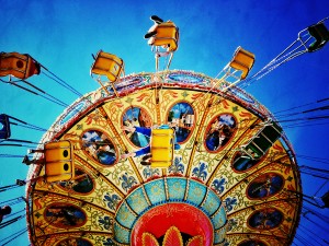 Instagram filtered image of an amusement park swing ride